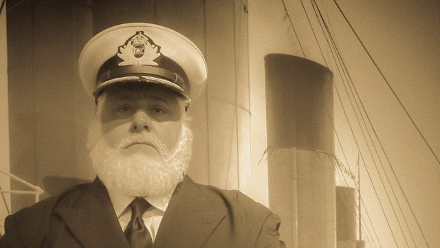 Captain-Smith a man wearing a uniform posing for a photo