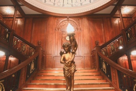a wooden statue in a room